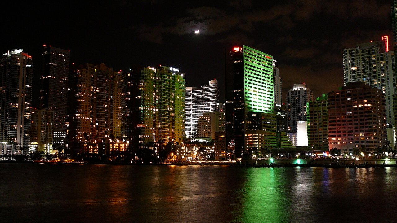 Brickell skyline lit up at night over the bay, Miami